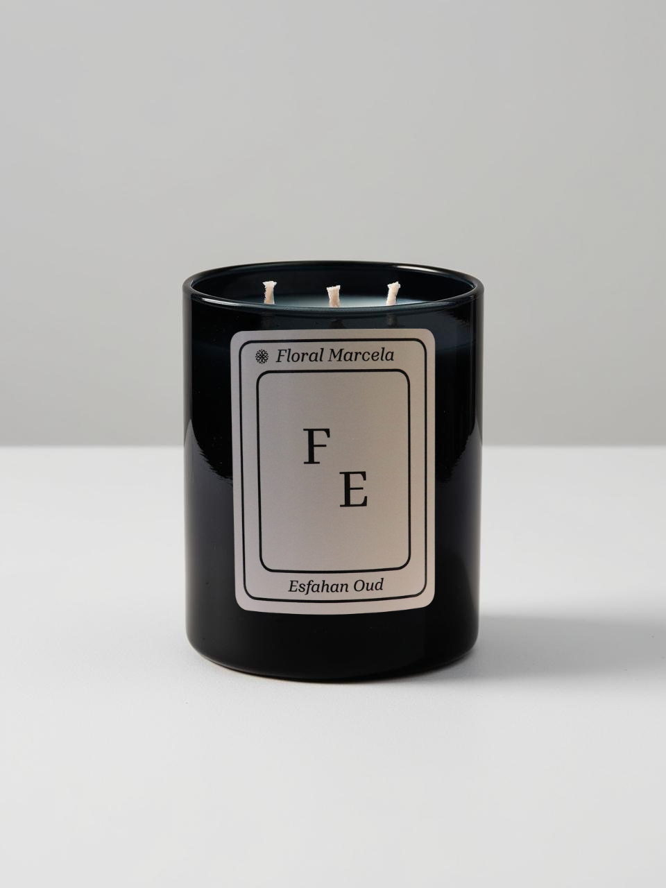 Fe large Esfahan Oud organic candle with triple wicks in black glass